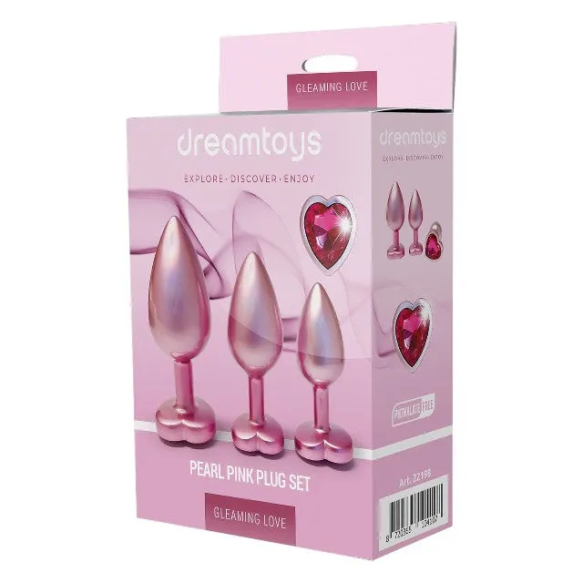 Set plug anal DREAMTOYS Pearl Pink Plug. 3 dopuri de dimensiuni progresive. 7.1 cm - 9.5 cm. cu baze în formă de inimă. roz