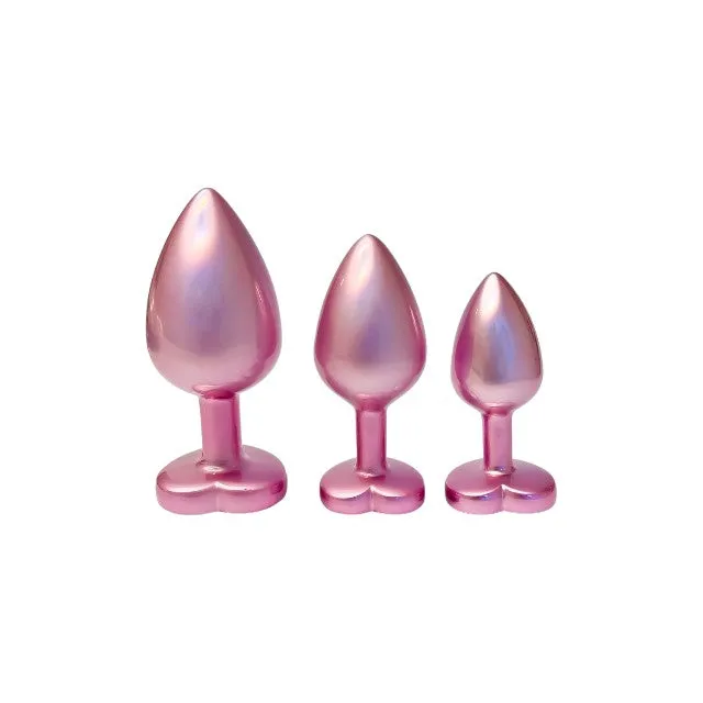 Set plug anal DREAMTOYS Pearl Pink Plug. 3 dopuri de dimensiuni progresive. 7.1 cm - 9.5 cm. cu baze în formă de inimă. roz